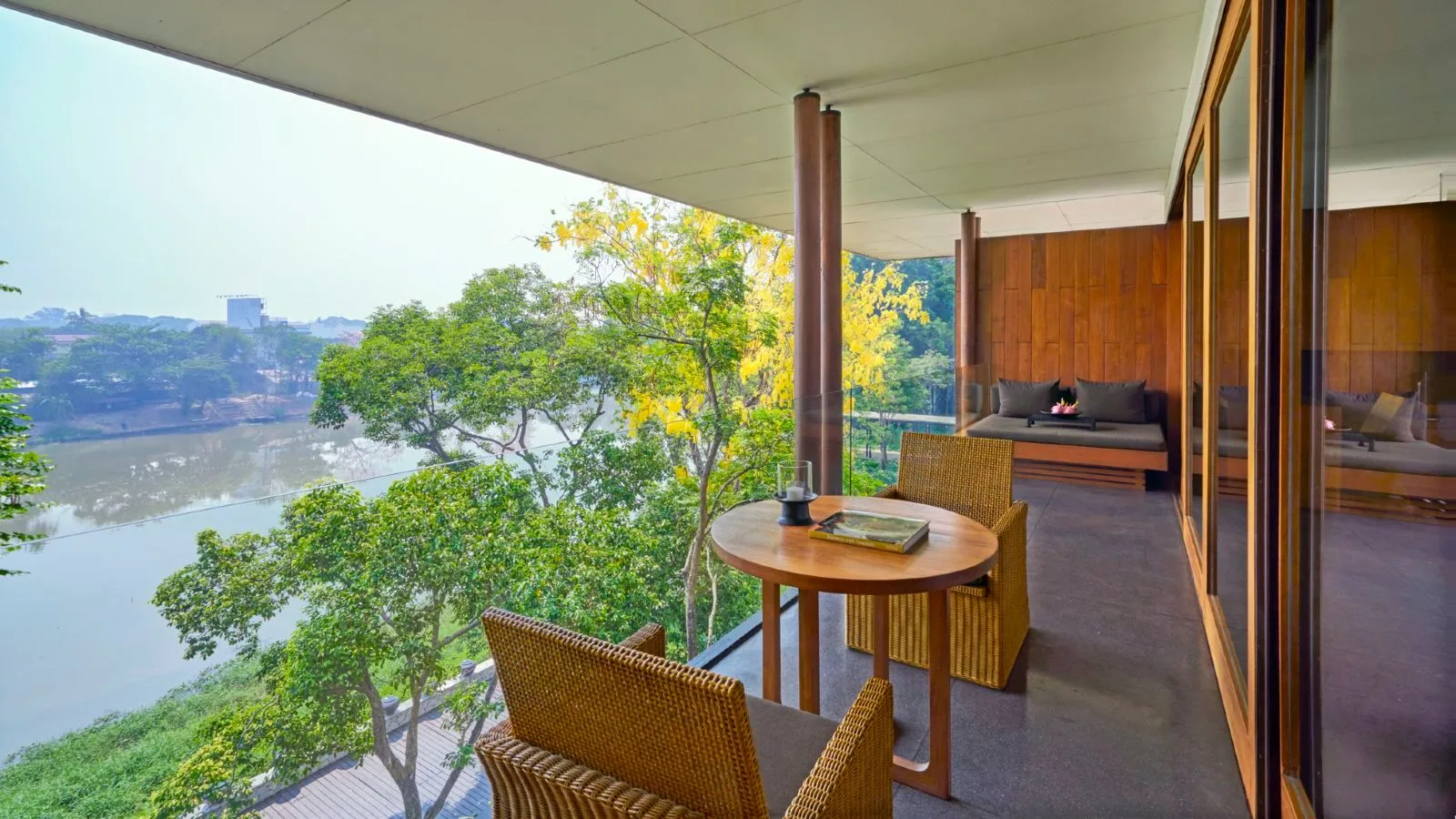 Anantara Chiang Mai Resort &mdash; a river-view room opening to the terrace