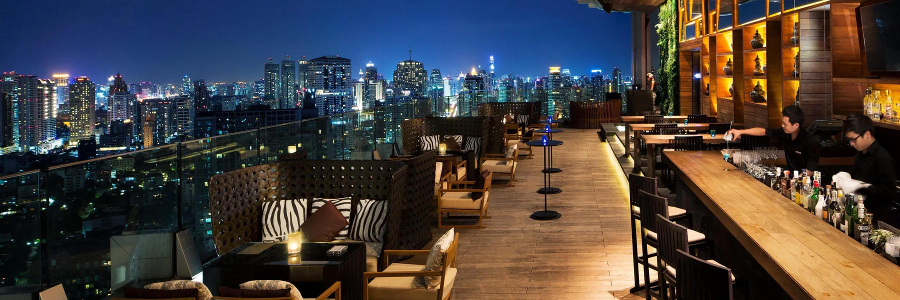 Octave Rooftop Lounge & Bar at Bangkok Marriott Hotel Sukhumvit at night, the Sukhumvit skyline beyond the glass