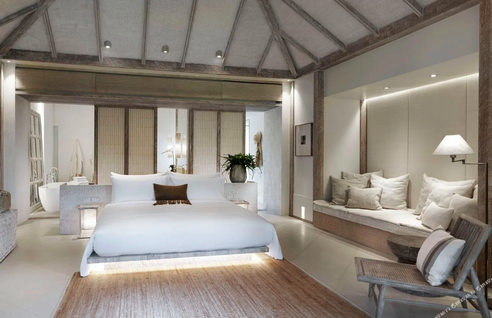 Raya Heritage &mdash; a suite interior in linen, cotton and pale wood