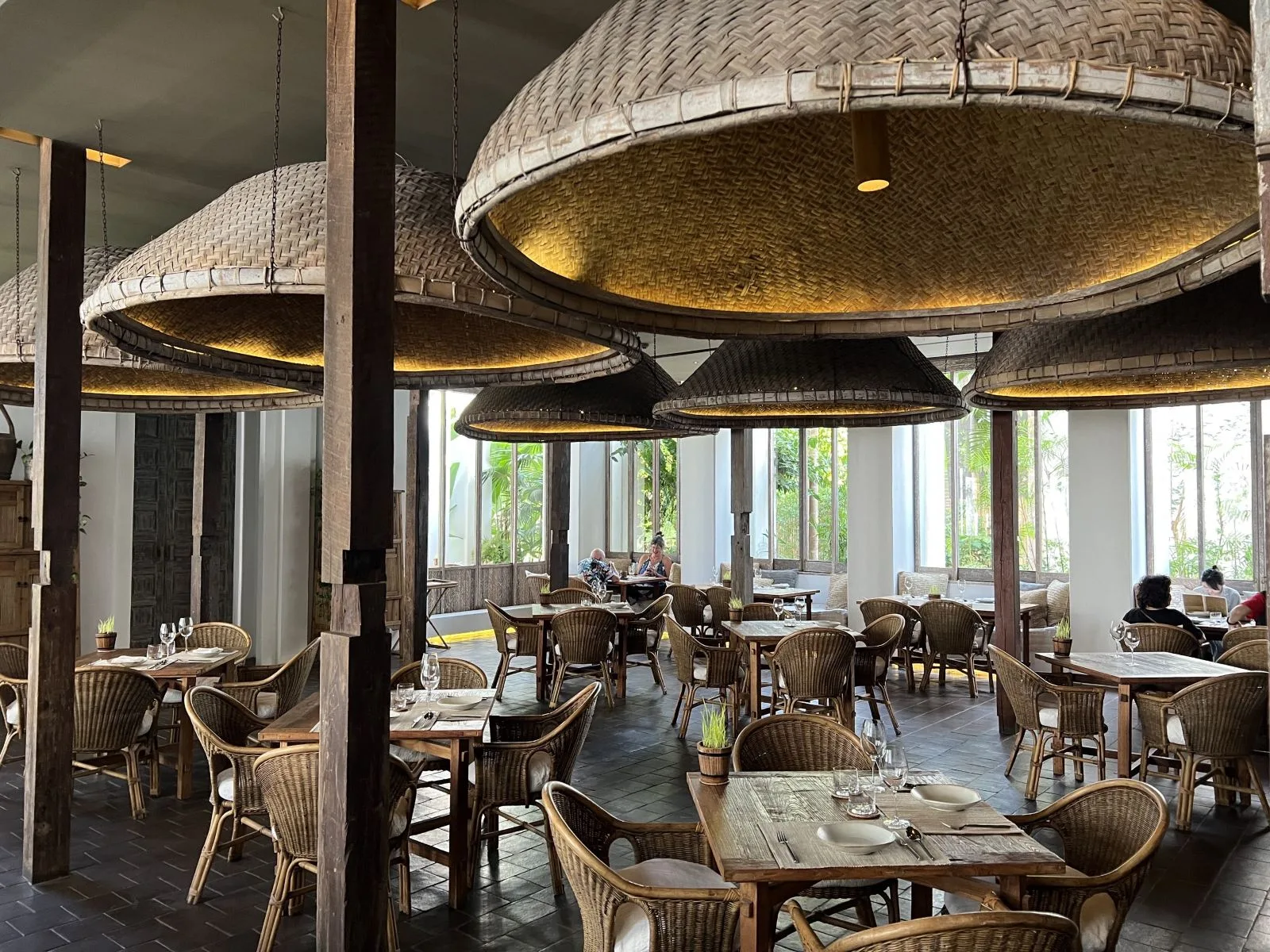 Raya Heritage &mdash; the restaurant under its woven pendant lamps