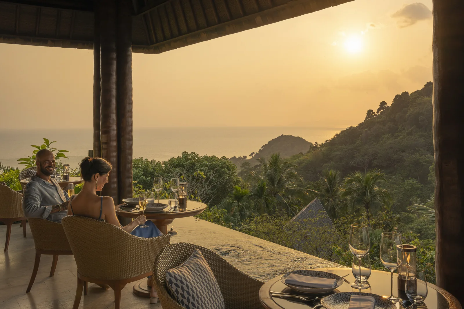 KOH Thai Kitchen at Four Seasons Koh Samui — hillside terrace tables at sunset