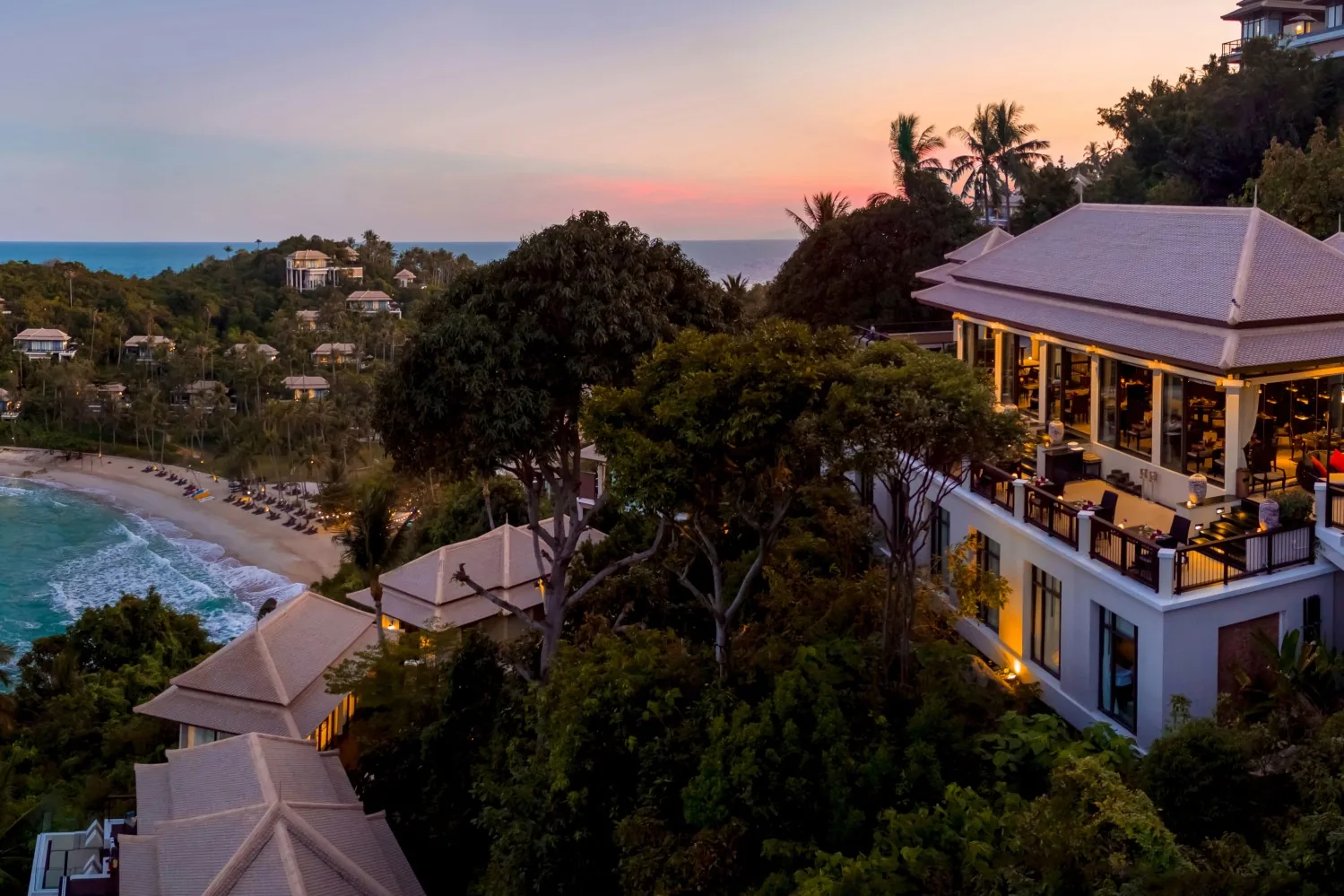 Saffron at Banyan Tree Samui — the hilltop pavilion above the bay at dusk