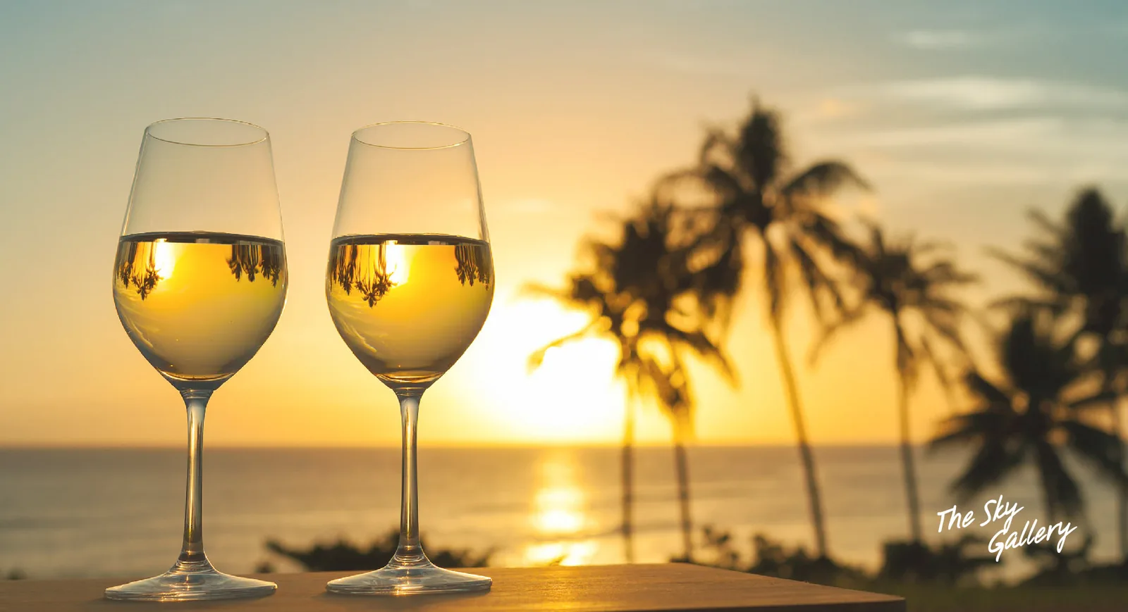 The Sky Gallery — wine at sunset over the Gulf